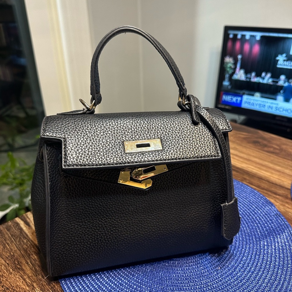 Elegant Black sleek mini Handbag